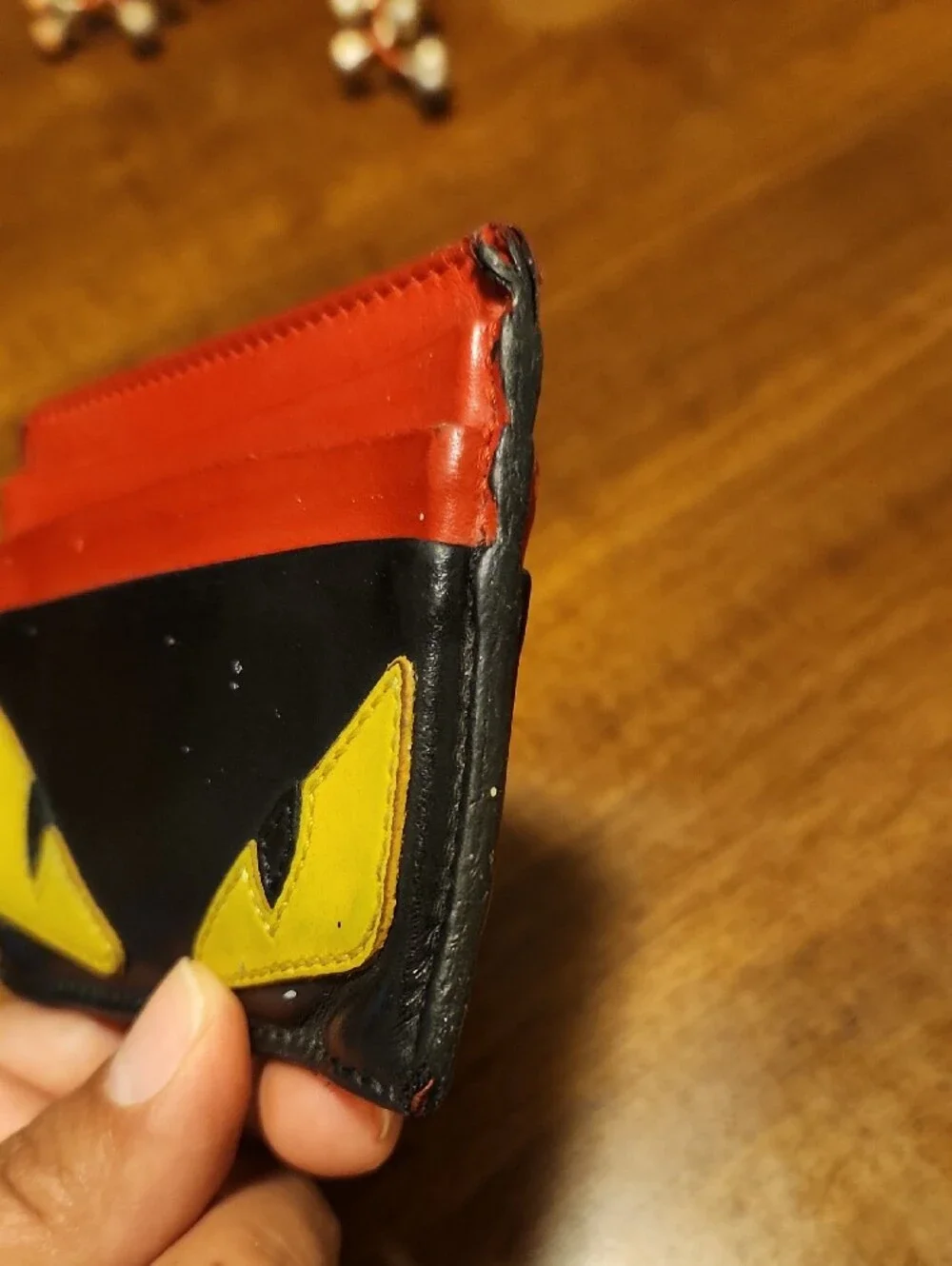 Fendi Black Card Holder with Red Slots and Yellow Eye Appliqués